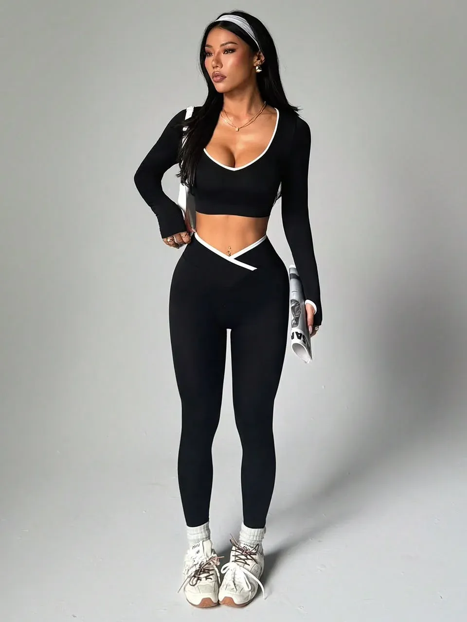 Conjunto deportivo negro manga larga