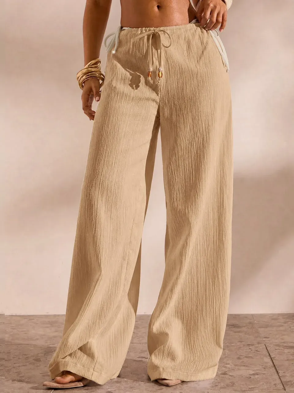 Pantalon beige corte ancho